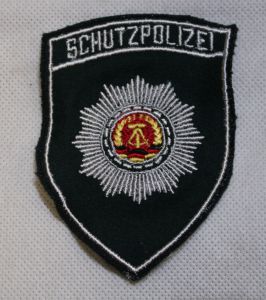 Emblemat DDR SCHUTZPOLIZEI nowy
